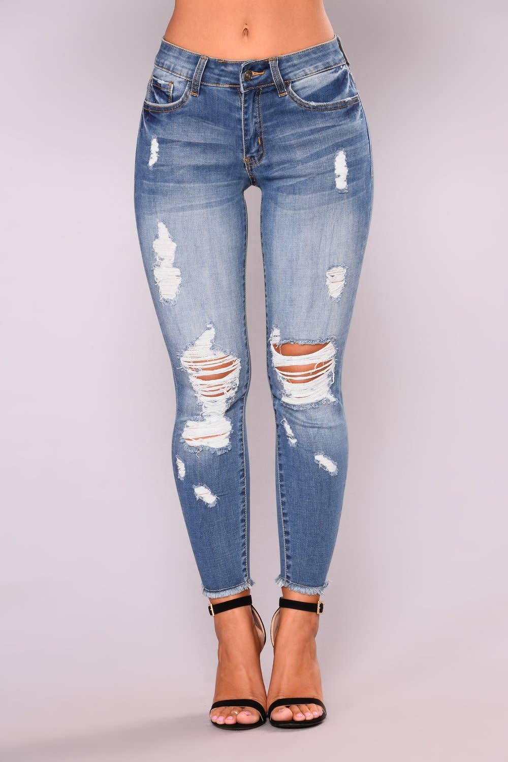Ripped Skinny Jeans with Hip Lift