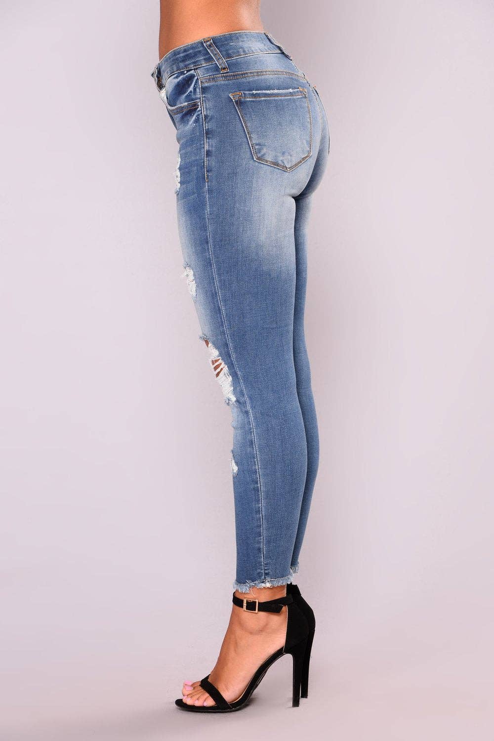 Ripped Skinny Jeans with Hip Lift